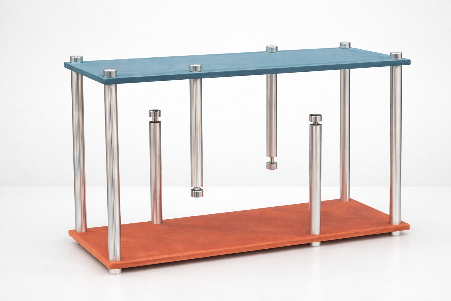 Enough (2024): blue and terracotta wooden panels joined by metal posts against a white background